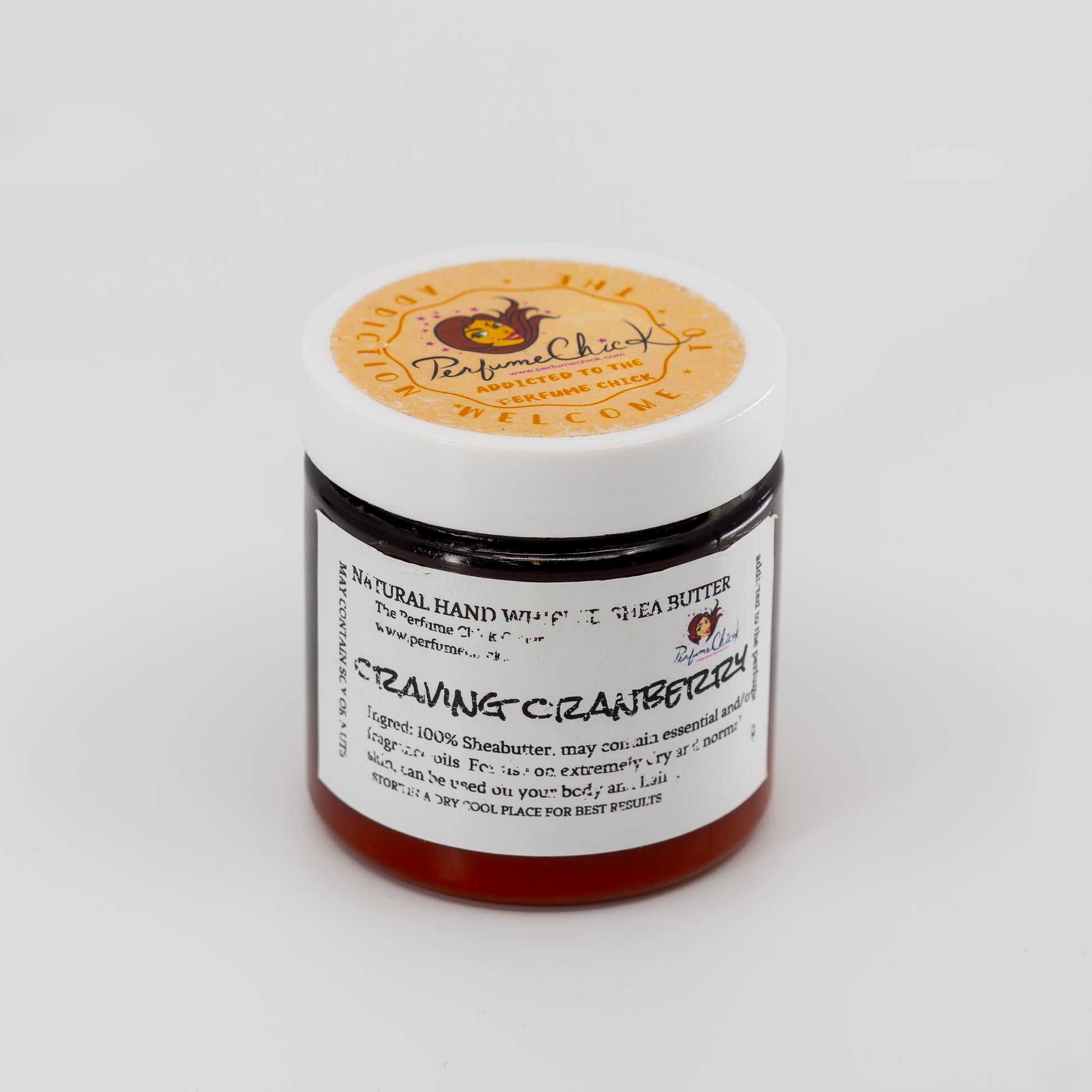 Jar of natural hand whip with shea butter on a white background