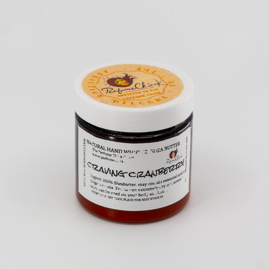 Jar of natural hand whip with shea butter on a white background