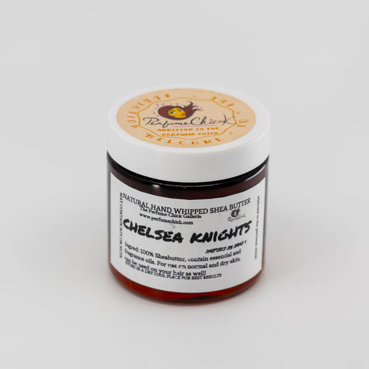 Jar of natural hand whipped shea butter with a label on a white background